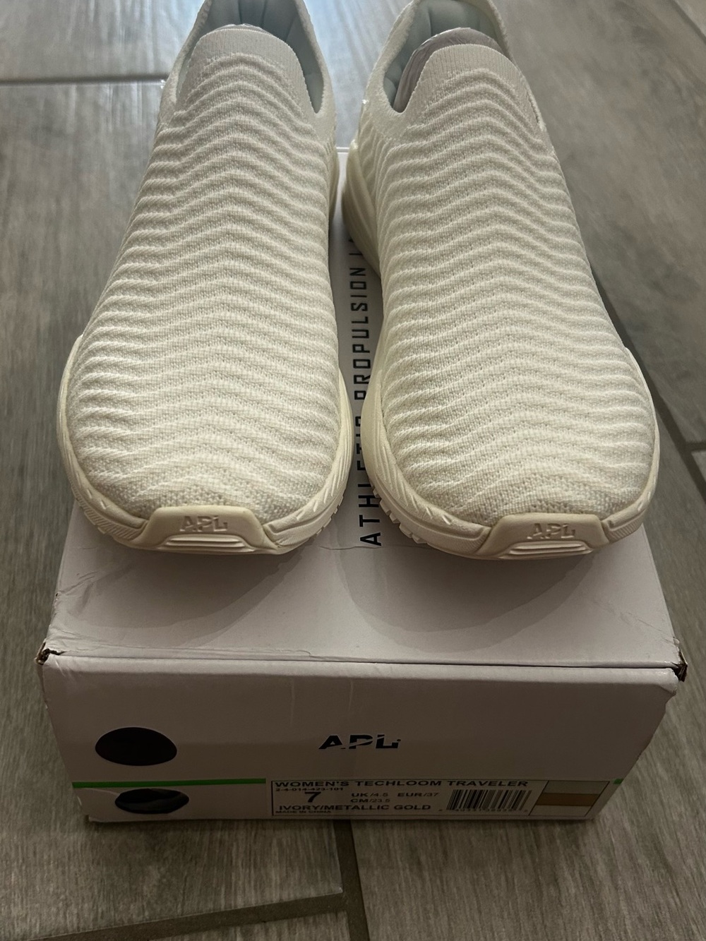 APL Women's TechLoom Traveler Sneakers in White Metallic Gold
